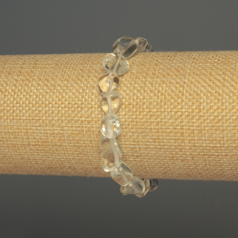 Faceted rock crystal bracelet, beads 8–12×9 mm, 18 cm length (stretch)