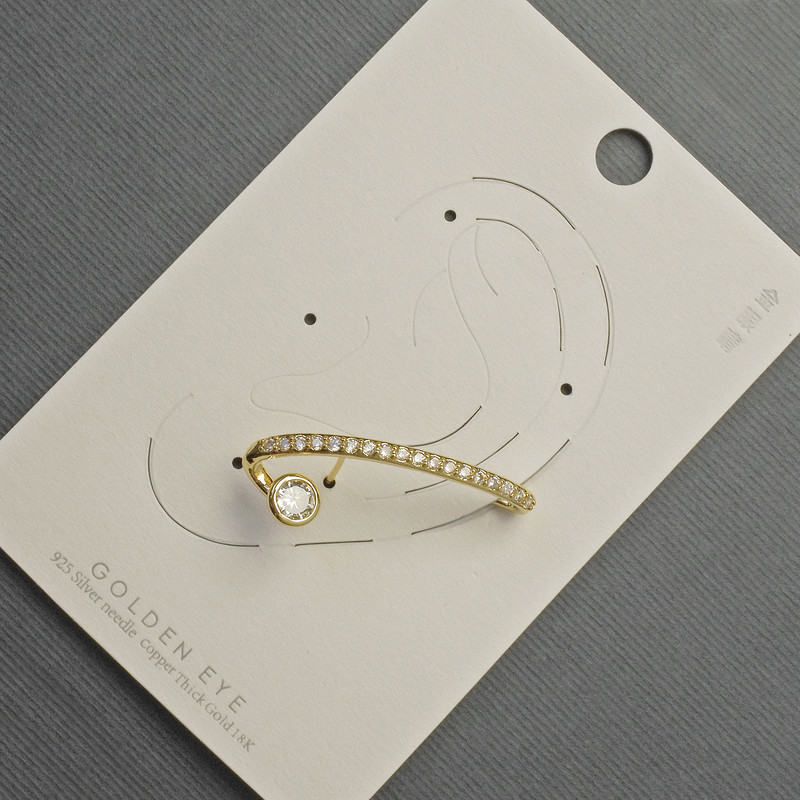 Clip-on ear earring, gold-tone metal, 12x32 mm, +/- white crystals