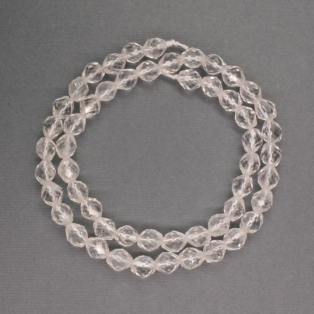 Beads natural stone Rock Crystal faceted bicones, diameter 6x7 mm ±, length 39 cm ±