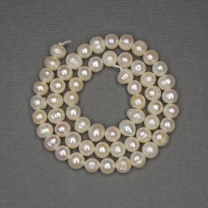 Freshwater White Oval Pearls on a Thread, 7x6 mm diameter, 35 cm length