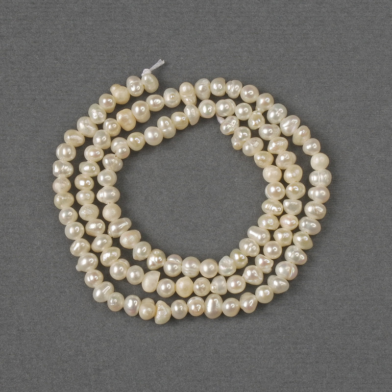 Natural freshwater pearl beads 3×4–4.5 mm, length 34 cm on a thread