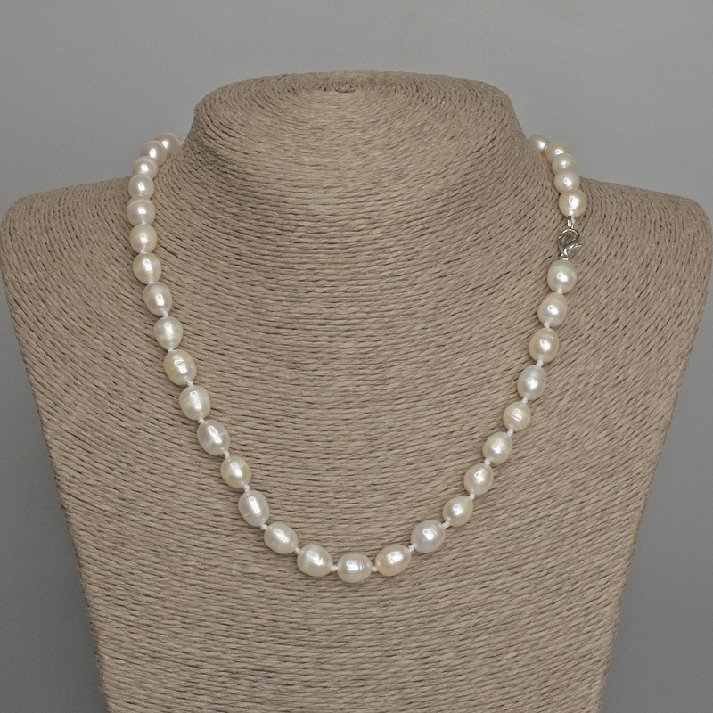 Necklace of natural freshwater pearls, oval, diameter 9-10×8 mm, length 46 cm, with a clasp