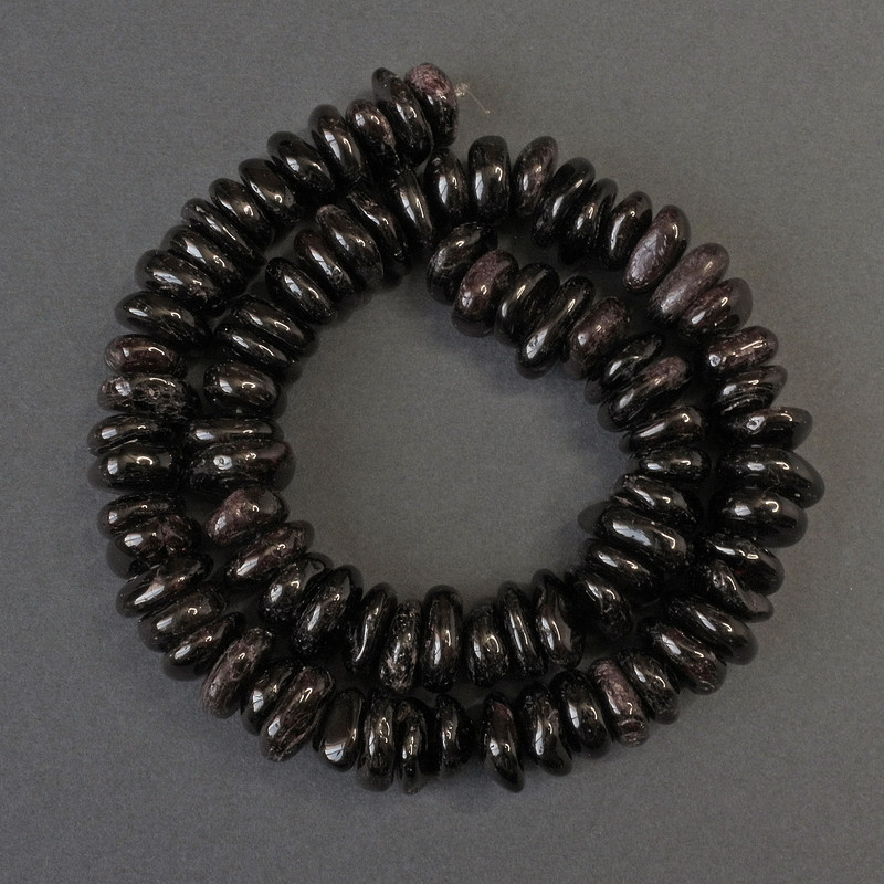 Garnet Beads, Faceted, 10–12×5–6 mm, on a beading thread