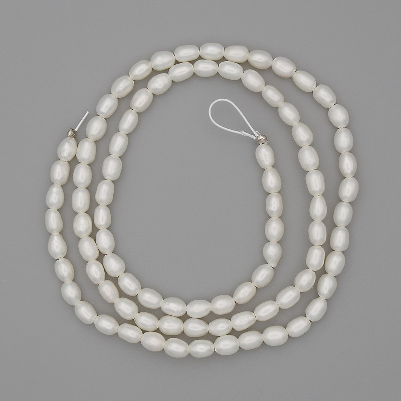 Natural freshwater pearl beads 5x3 mm, length 39 cm on thread