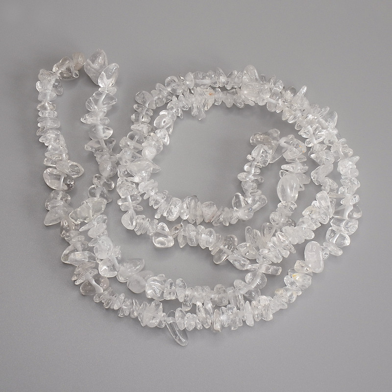 Rock crystal chip beads, diameter 10x3-5mm+-, length 76 cm+- on a thread