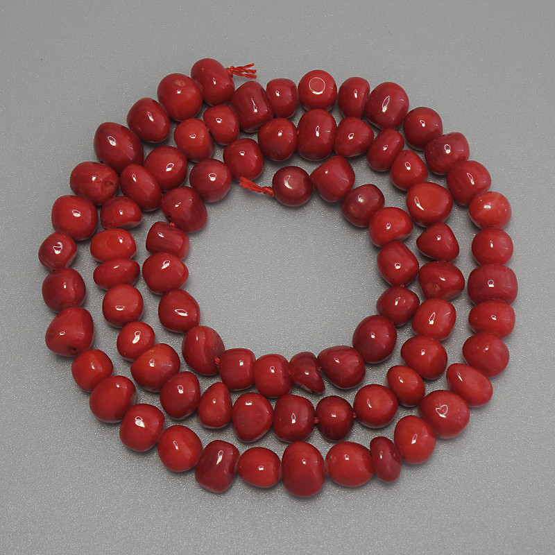 Faceted Coral Beads, 6x5 mm, 41 cm long on thread