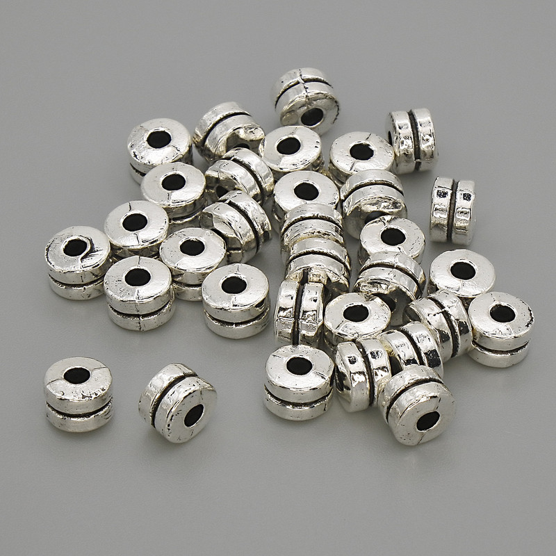 Bead insert findings, metal color: silver, diameter 6x4 mm +/- hole diameter 2.2 mm +/- packaging 20 g (~30 pcs)