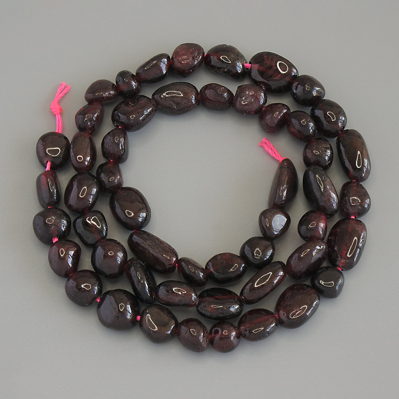 Faceted Garnet Beads, diameter 8-12×6-8 mm, on thread, length 40 cm+