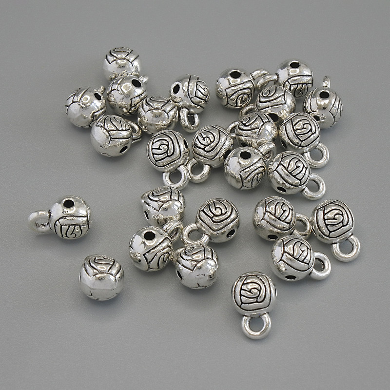 Silver-tone bail hardware, silver-colored metal, sizes 6x9 mm ±, hole diameters 1.7 mm ± and 2 mm ±, packaging 20 g, 25 pcs
