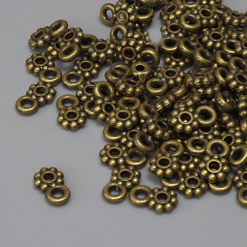 Bronze-colored pendant, diameter 7 x 4.5 mm, 1.5 mm ear hole, pack of 84 pcs