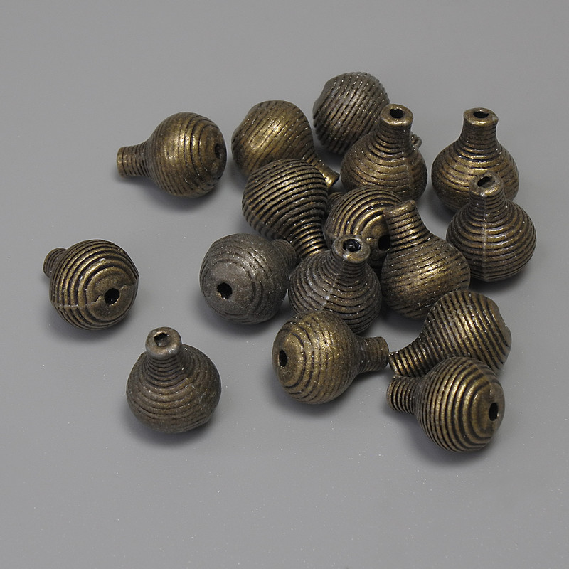 Bronze-colored bead-insert hardware, diameter 10x73mm ±, hole diameter 1mm ±, packaging 15 pcs.