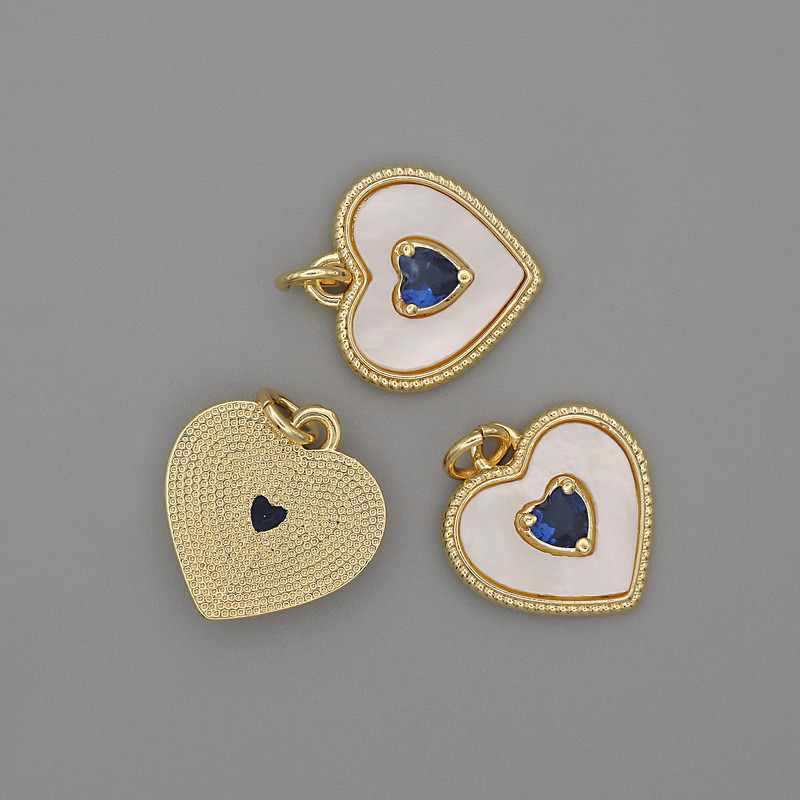 Pendant Mother-of-Pearl Heart 15x15 mm ± Blue Crystal, Length 18 mm ± Gold-Tone Metal