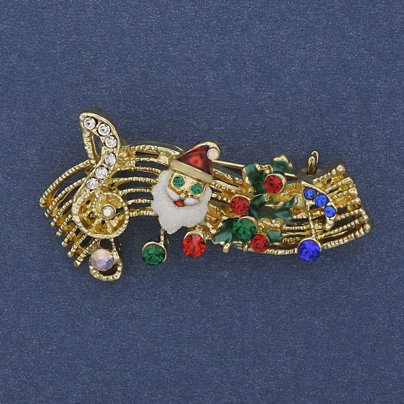 Brooch 'New Year Melody' red, green and white enamel, crystals, gold-toned metal, 23×43 mm +