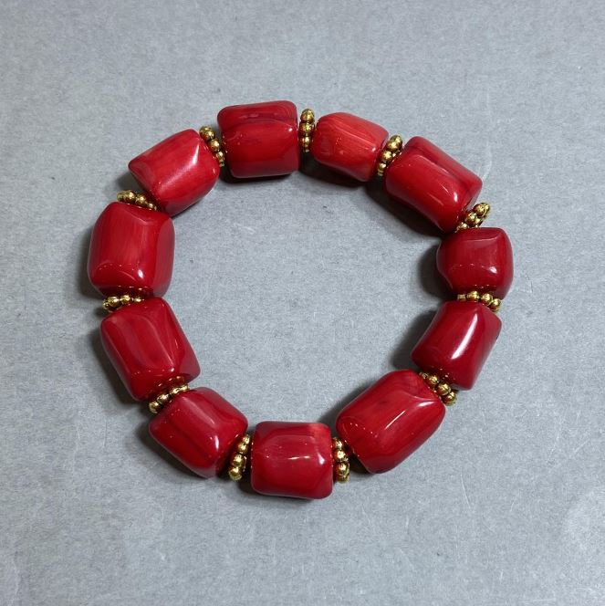 Coral Bracelet – Faceted Cut 12-16×11-13 mm +/- with Metal Inserts, Length 18 mm +/- Stretch