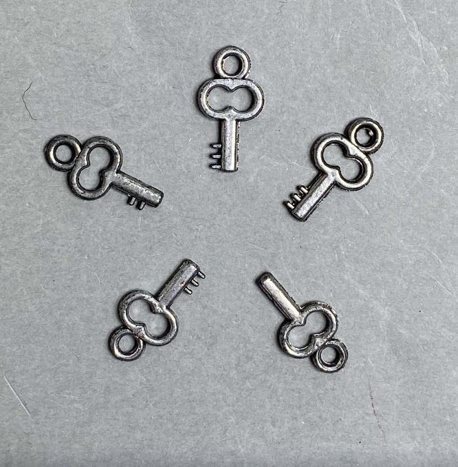 AUCTION! 0.5 kg Packaging - Key Pendant, Plastic, Dark Silver Color, 20x11x3 mm, hole diameter approx. 3 mm