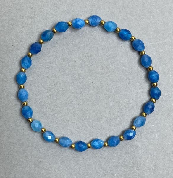 Apatite bracelet with faceted beads, 6×4 mm; hematite beads 2 mm; length about 18 cm; stretch