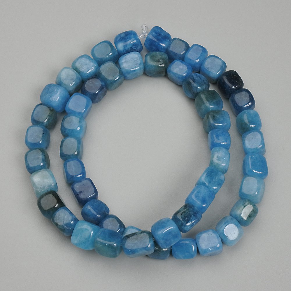 Apatite cube beads, 7 mm diameter, about 39 cm long on thread