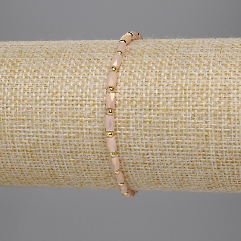 Beige Czech crystal bracelet with faceted cylindrical beads 5x3 mm +/- and 2 mm +/- beads, 18 cm stretch