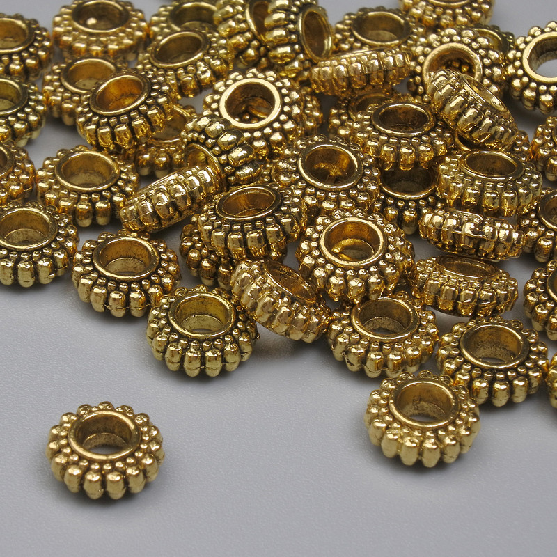 Gold-tone bead insert findings, 7x3 mm, hole approx. 2.8 mm, packaging 20 g (~41 pcs)