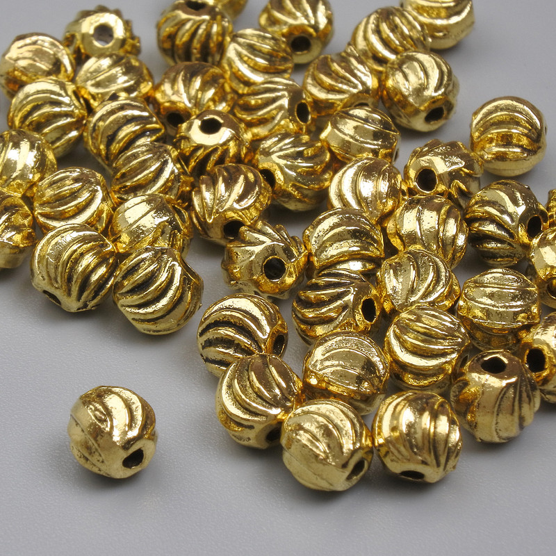 Bead insert findings, gold-tone color, 5 mm diameter with a 1 mm hole, packaging 20 g (~52 pcs)
