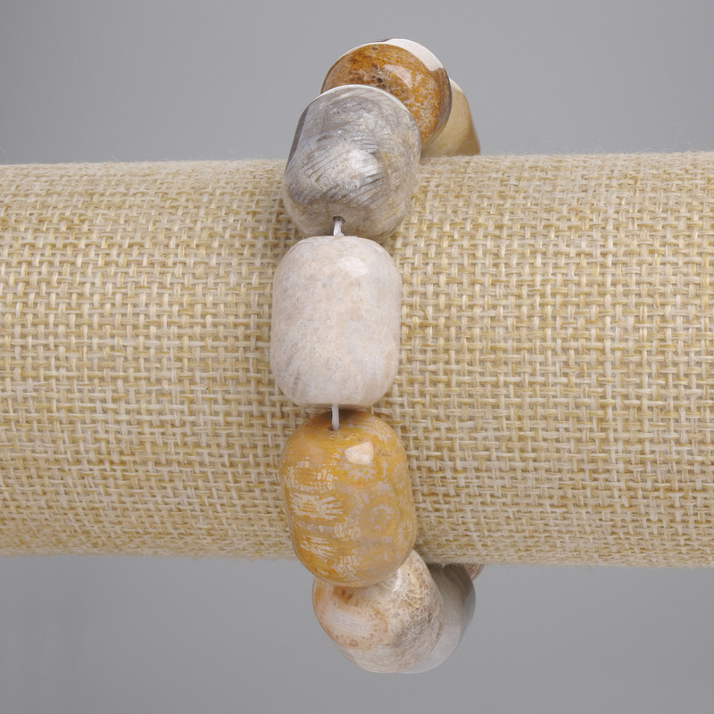 Bracelet with fossilized coral barrel beads, diameter 19x15 mm, length approx. 18 cm, elastic