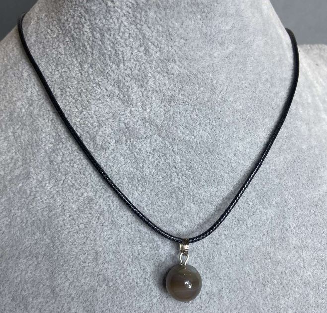 Agate ball pendant, diameter 12 mm ±, on a cord, length 60 cm + 5 cm chain