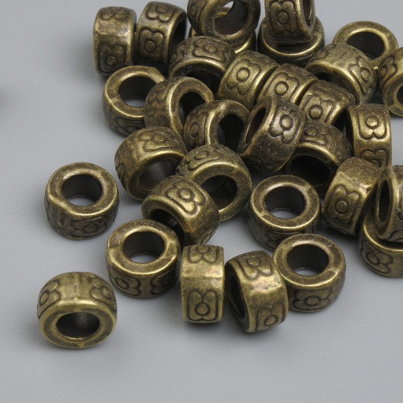 Bronze-colored bead insert findings, 6.5 x 3.5 mm, hole diameter approx 4 mm, packaging 20 g ~ 35 pcs +
