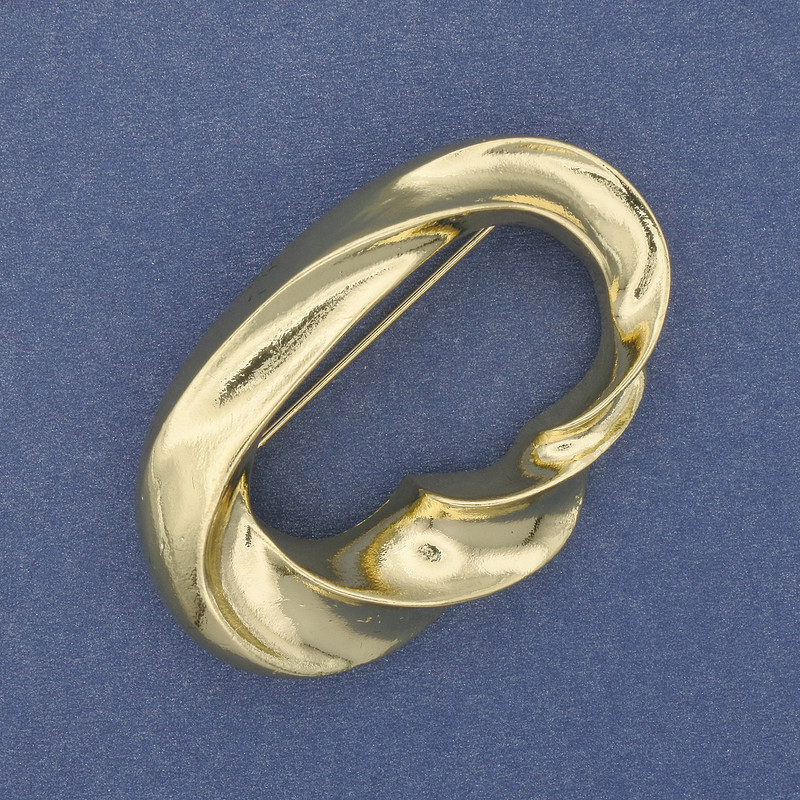 Brooch 'Accent' in golden metal, 50x33 mm+