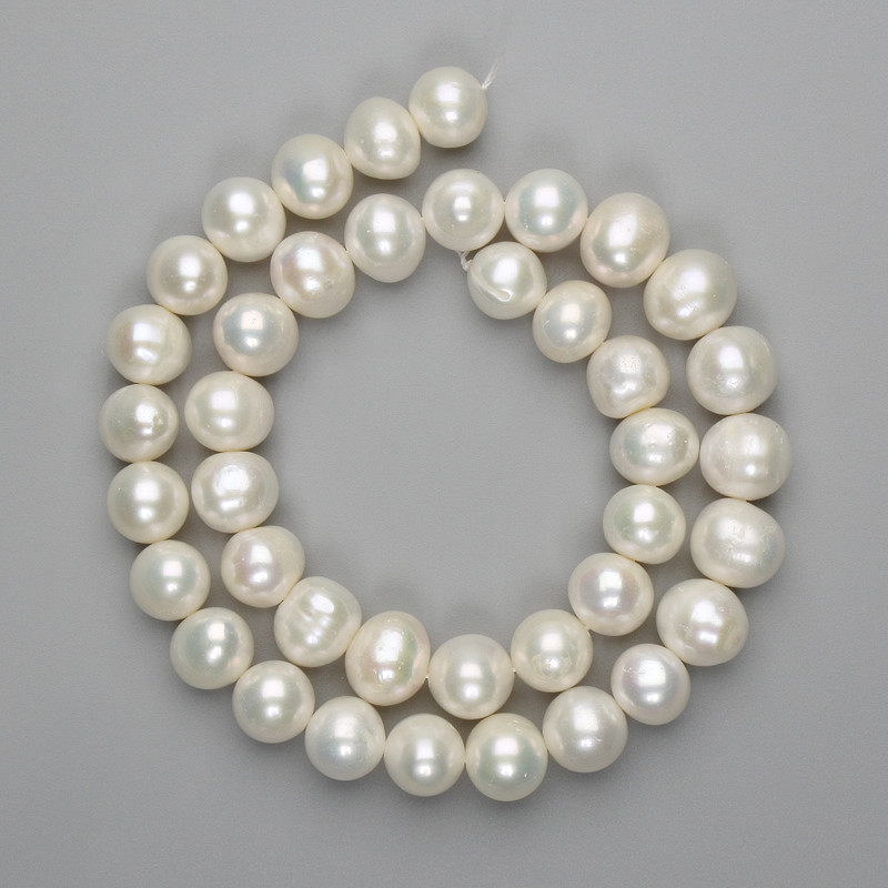 Natural freshwater pearl beads, 10.5–11×9–9.5 mm, length approx. 38 cm, on a thread