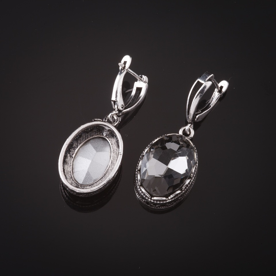Earrings with gray crystals in a 'tooth' setting, oval stone 2 x 1.6 cm, length 4 cm