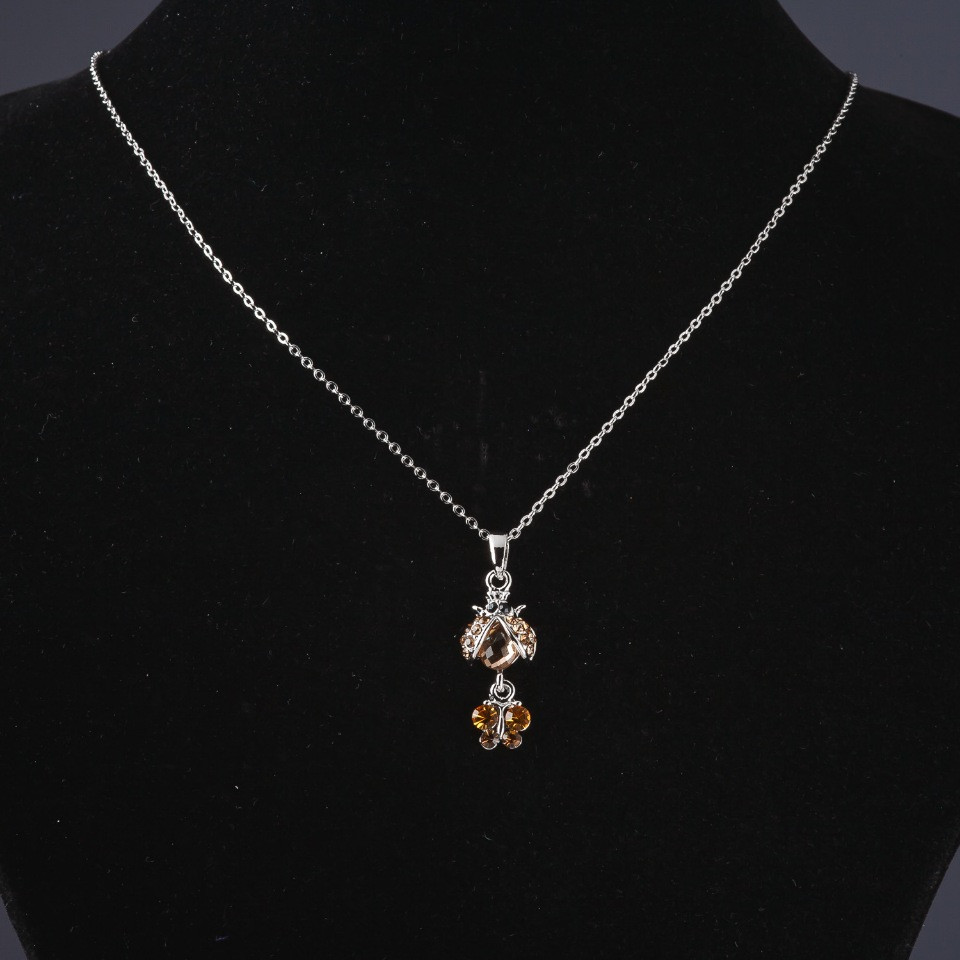 Ladybug pendant on chain, 55 cm chain length, 3.5 cm pendant length