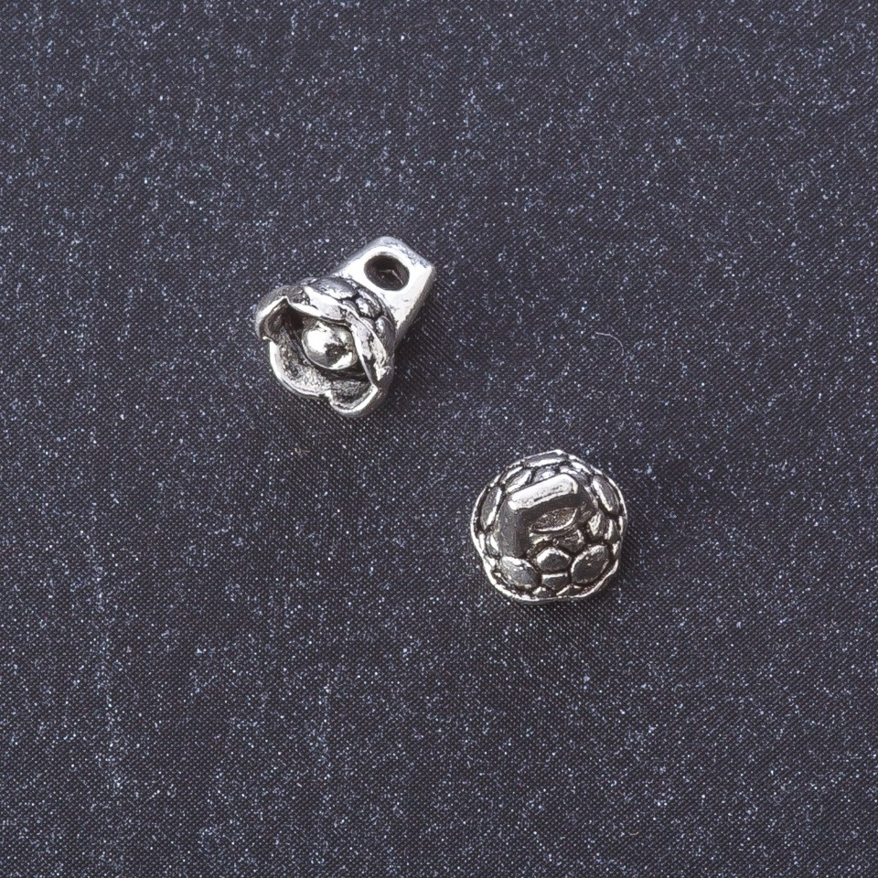 Bell pendant findings, metal color 'Silver', length 8 mm, packaging 20 g, ±47 pcs