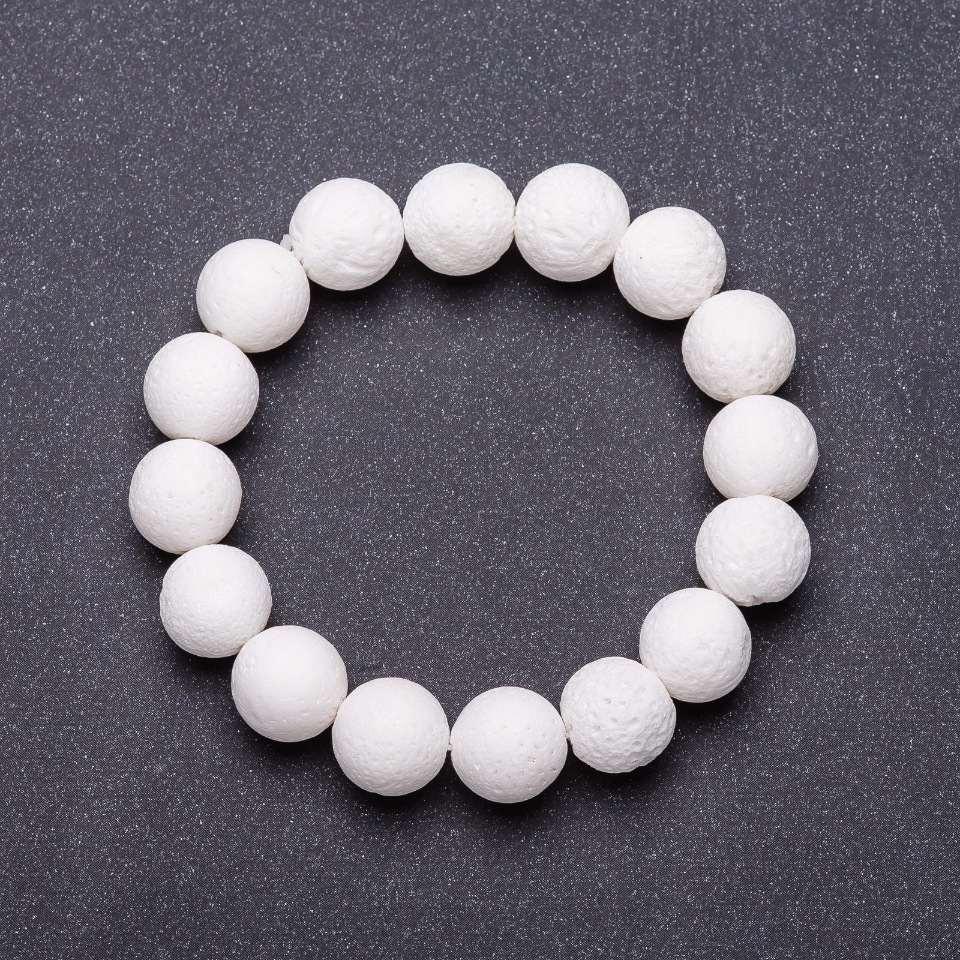 Elastic bracelet with white sponge coral beads, 12 mm diameter, 18 cm length