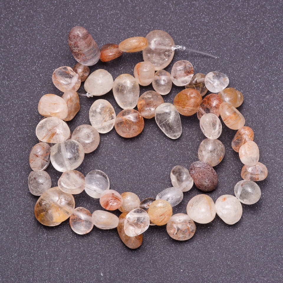 Beads of natural stone Quartz Rutilated - Assorted Faceted 'Butterfly', diameter 6–12 mm, 40 cm strand