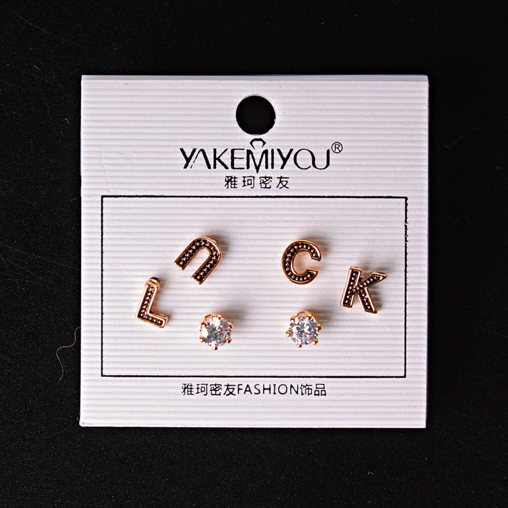 (5 mm) LUCK letter-stud earrings with a gold rhinestone