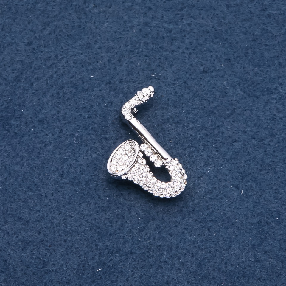 Brooch from the musical series 'Saxophone' 28x25mm, metal color 'silver'