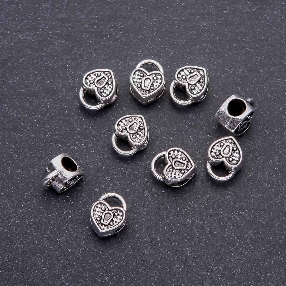 Pandora Heart Bead Insert, 10x12 mm, bore 4.8 mm, pack 20 g +/- 9 pcs