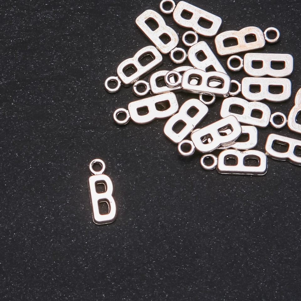 Pendant finding Letter 'B' 17x7 mm, packaging 20 g (± 25 pcs)