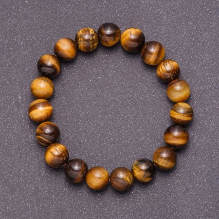 Bracelet made of natural Tiger's Eye on elastic, 12mm bead diameter, 18 cm circumference