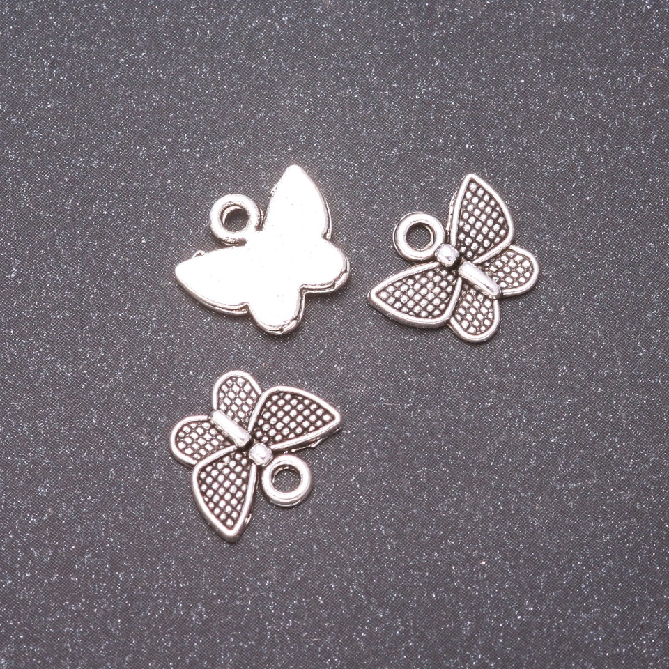 Butterfly Pendant Findings, diameter 13×11mm, inner diameter 1.7mm, packaging 20 g ± 32 pcs