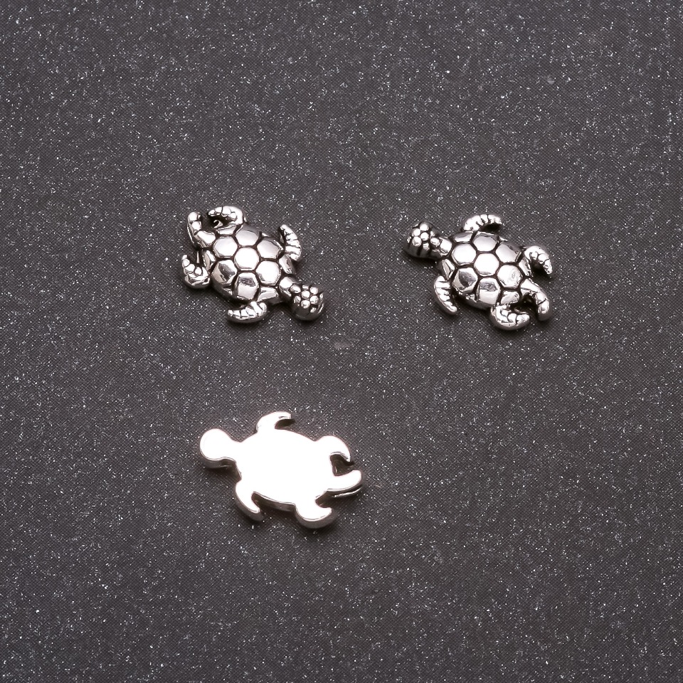 Bead-insert Turtle, 13×9 mm, bore 1 mm, packaging 20 g +/- 23 pcs