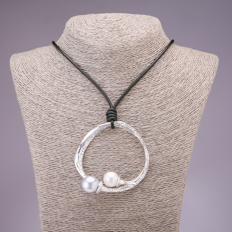 Hi-tech pendant on a long cord, 68 mm diameter, 80 cm length, silver-colored metal