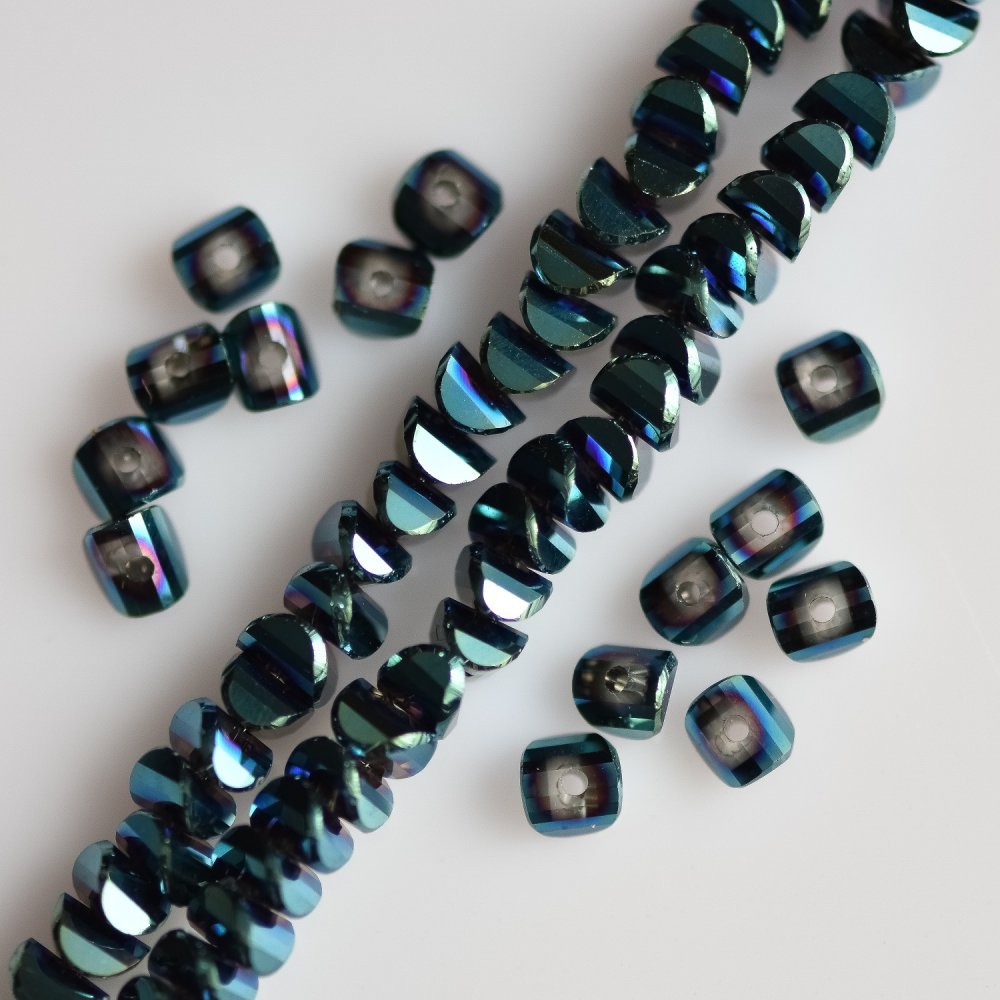 Crystal beads in Swarovski style, dark 'Sea Wave' with 'gasoline' coating, size 2.5x4 mm, thread length 48 cm