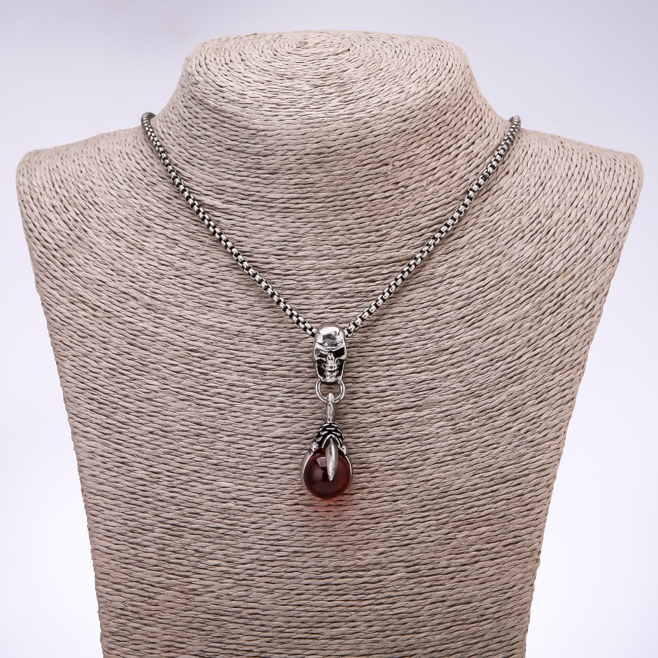 Pendant in Punk Goth Style: Ball in Claws, 15x32 mm on a chain, 65 cm long