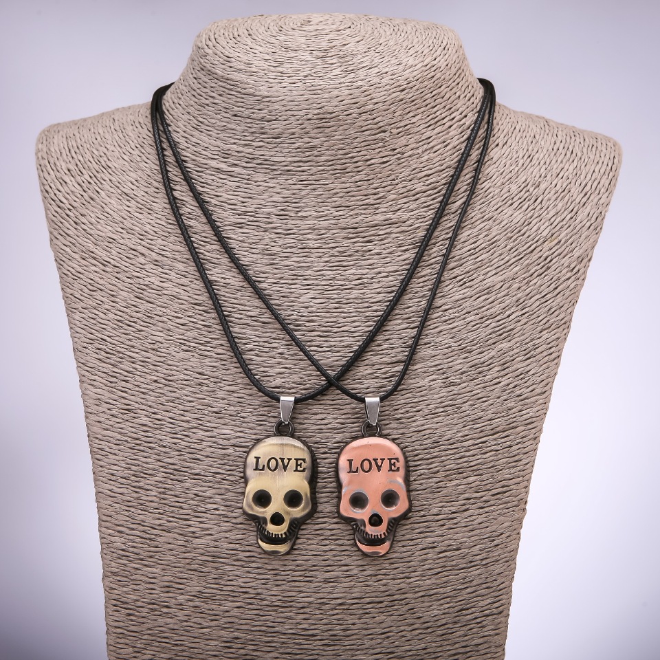 Pair of Skull Friendship Pendants, length 42–48 cm, diameter 40×23 mm