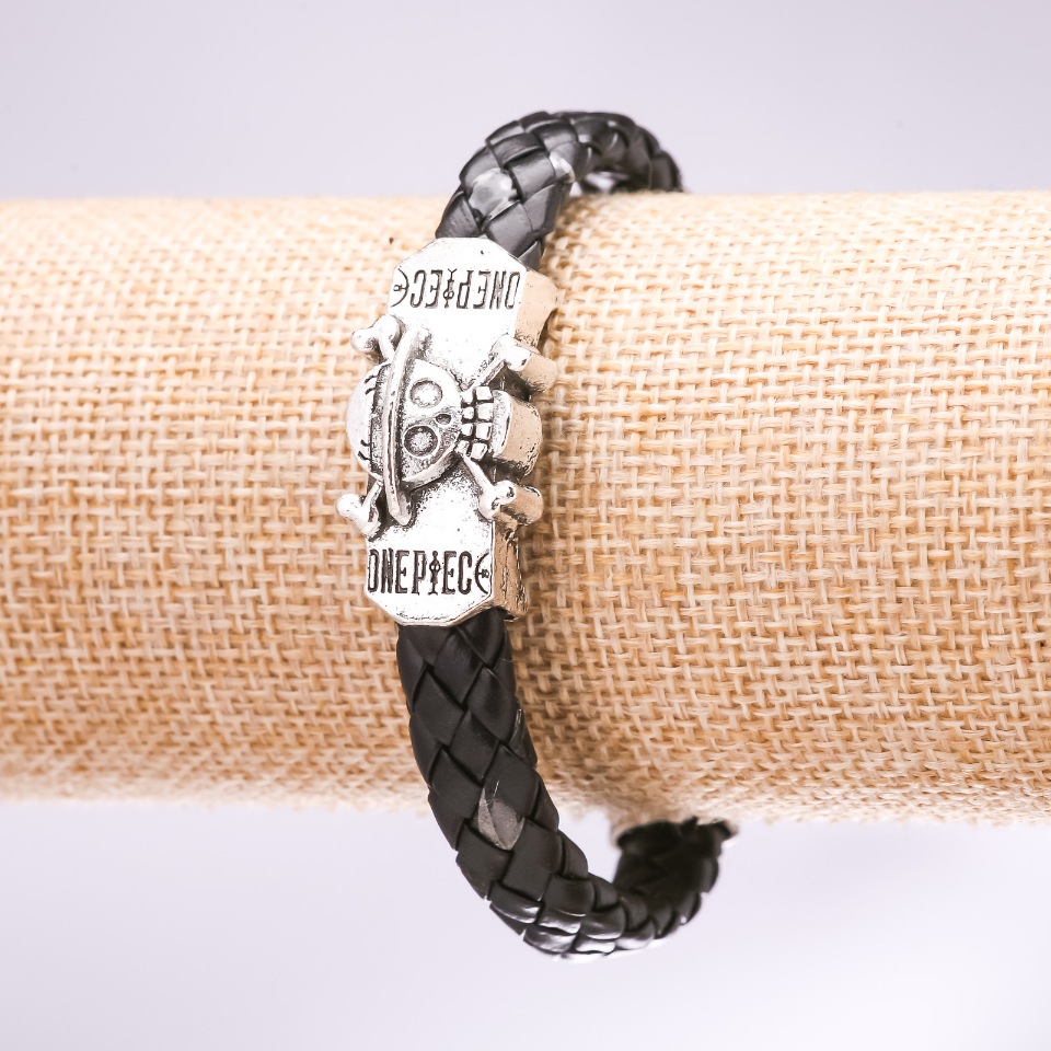 Skull bracelet in braided eco leather, black, 20 cm long