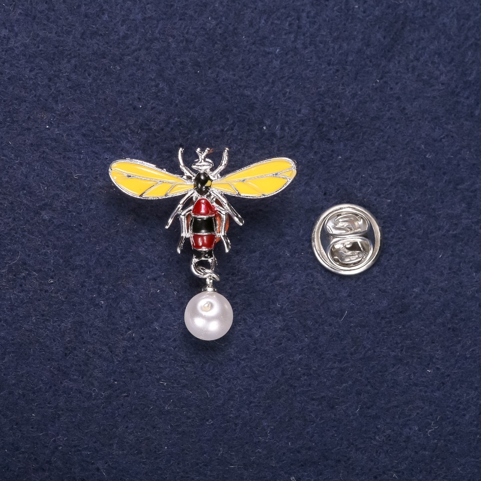 Brooch 'Bee' with pearl bead enamel, color yellow, brown and white, 29x32 mm, silver-toned metal