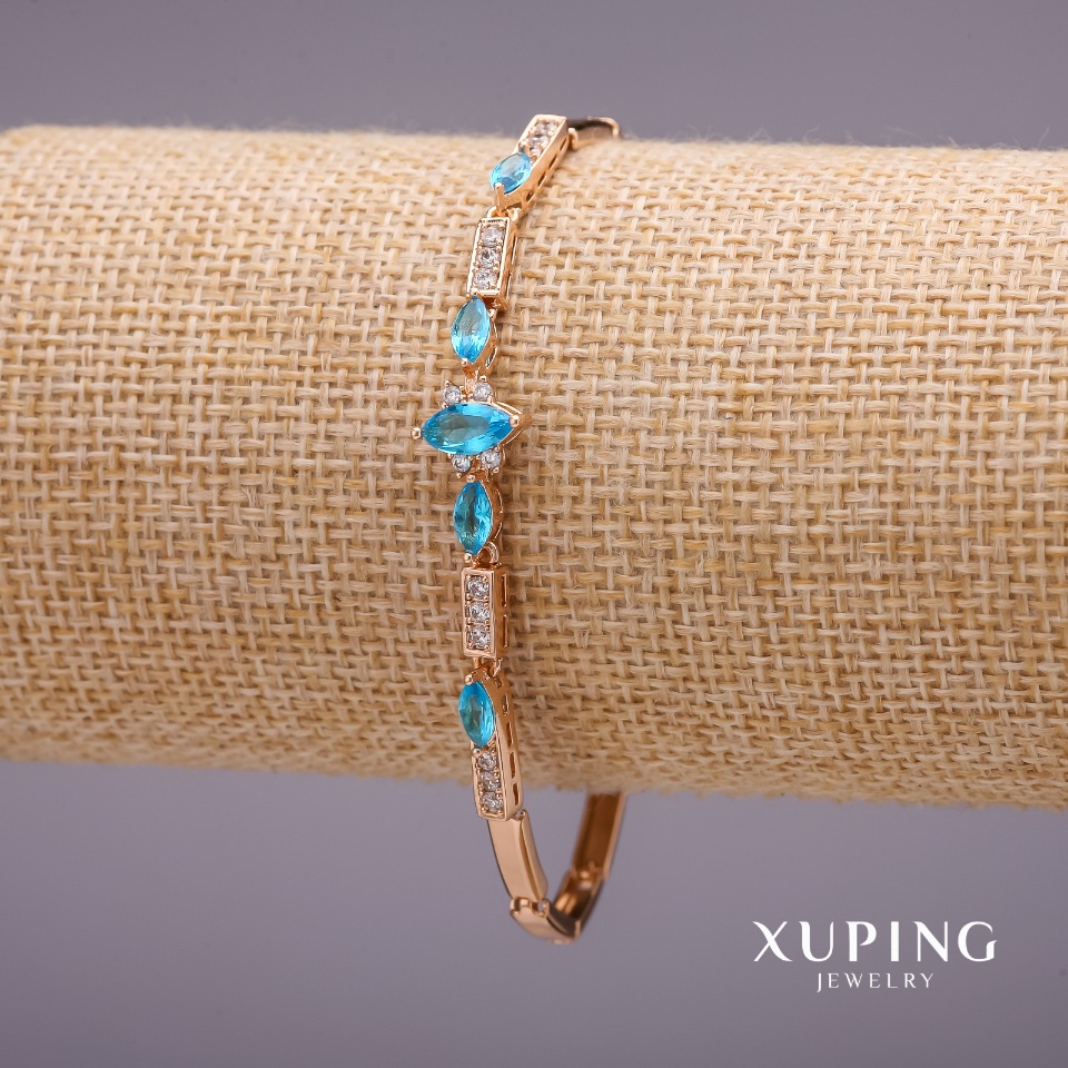 Xuping bracelet with blue stones, 3-9 mm thick, 19 mm long, 18k gold plating