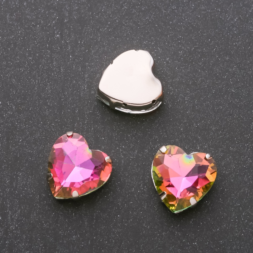 Price per unit / 10 pcs. Sew-on crystal in a heart setting 14mm pink-green