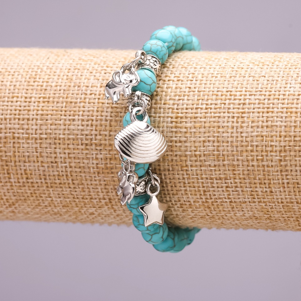Bracelet with Turquoise and Charms, 8 mm diameter beads, 18 cm length